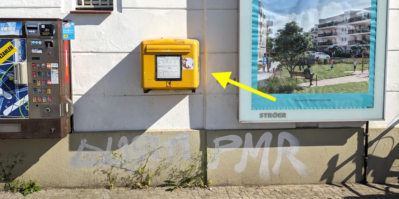 A yellow Deutsche Post mailbox